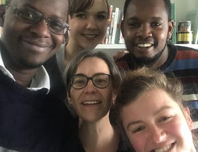 A selfie with four PhD students and their supervisor in their midst. 