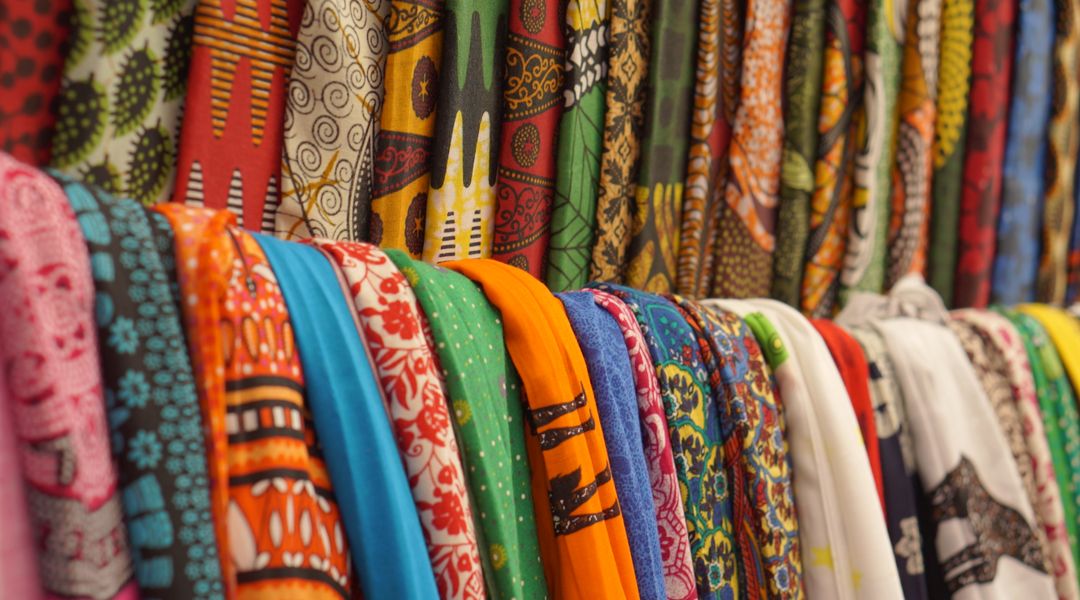 Colorful Tanzania fabrics that are exhibited and sold on the streets of Zanzibar town.